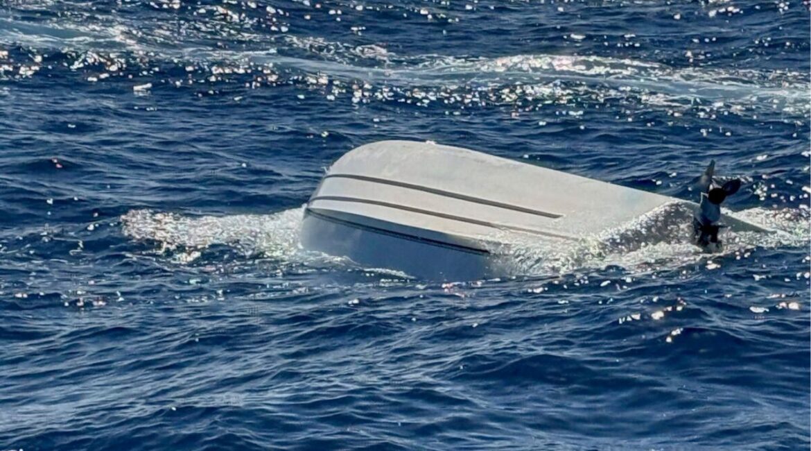 A photo provided by the U.S. Coast Guard shows a capsized boat off Florida's Atlantic Coast. Five migrants are feared dead after their boat capsized en route from the Bahamas to Florida in “a suspected failed smuggling venture,” officials said on Monday, April 14, 2025. (U.S. Coast Guard via The New York Times)
