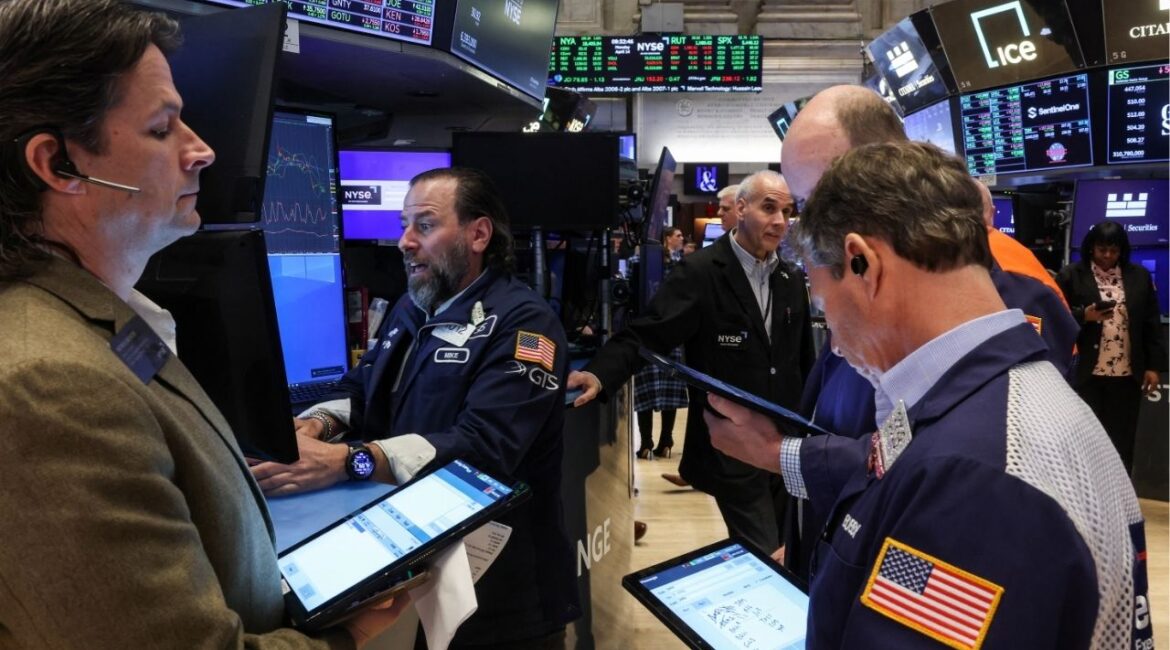 Traders work on the floor at the New York Stock Exchange (NYSE) in New York City, U.S., April 14, 2025. (REUTERS File)
