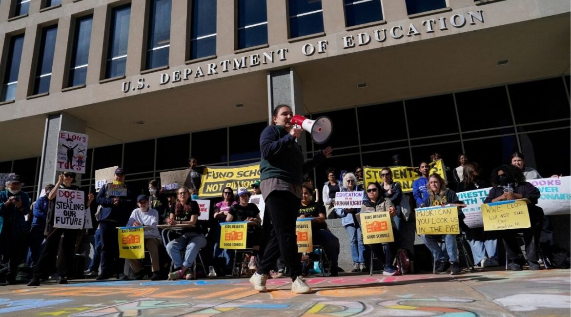 A demonstrator speaks through a megaphone during a Defend Our Schools rally to protest U.S. President Donald Trump's executive order to shut down the U.S. Department of Education, outside its building in Washington, D.C., U.S., March 21, 2025. (REUTERS File)