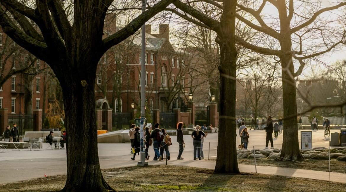 People cross Harvard Science Center Plaza in Cambridge, Mass. on April 3, 2025. Harvard’s decision to push back on the Trump administration’s demands marked a turning point in confrontations between schools and the government. (Sophie Park/The New York Times)