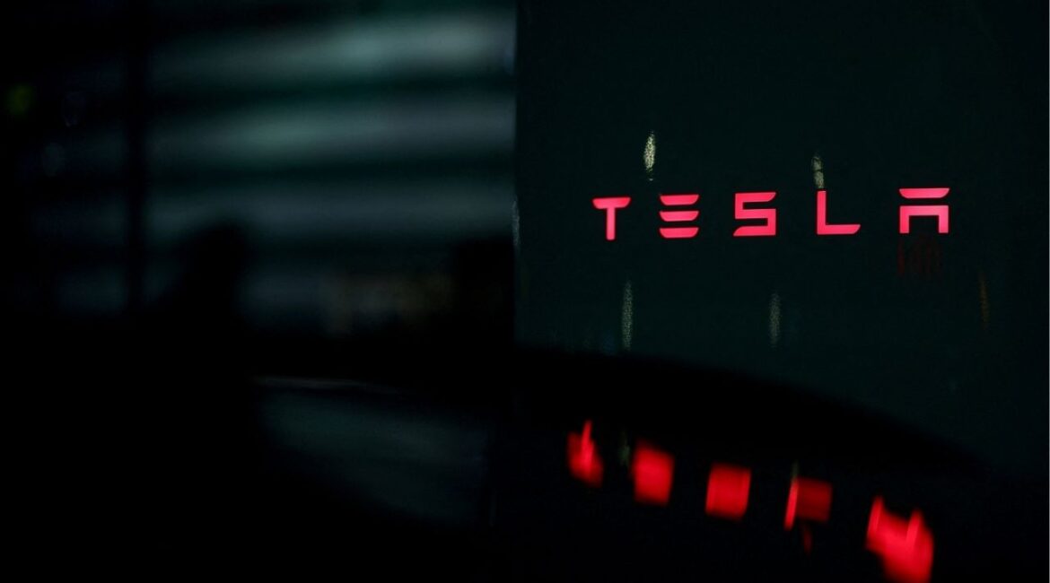 The logo of Tesla adorns a Tesla Super Charging station in Saint-Herblain near Nantes, France, March 25, 2025. (REUTERS File)