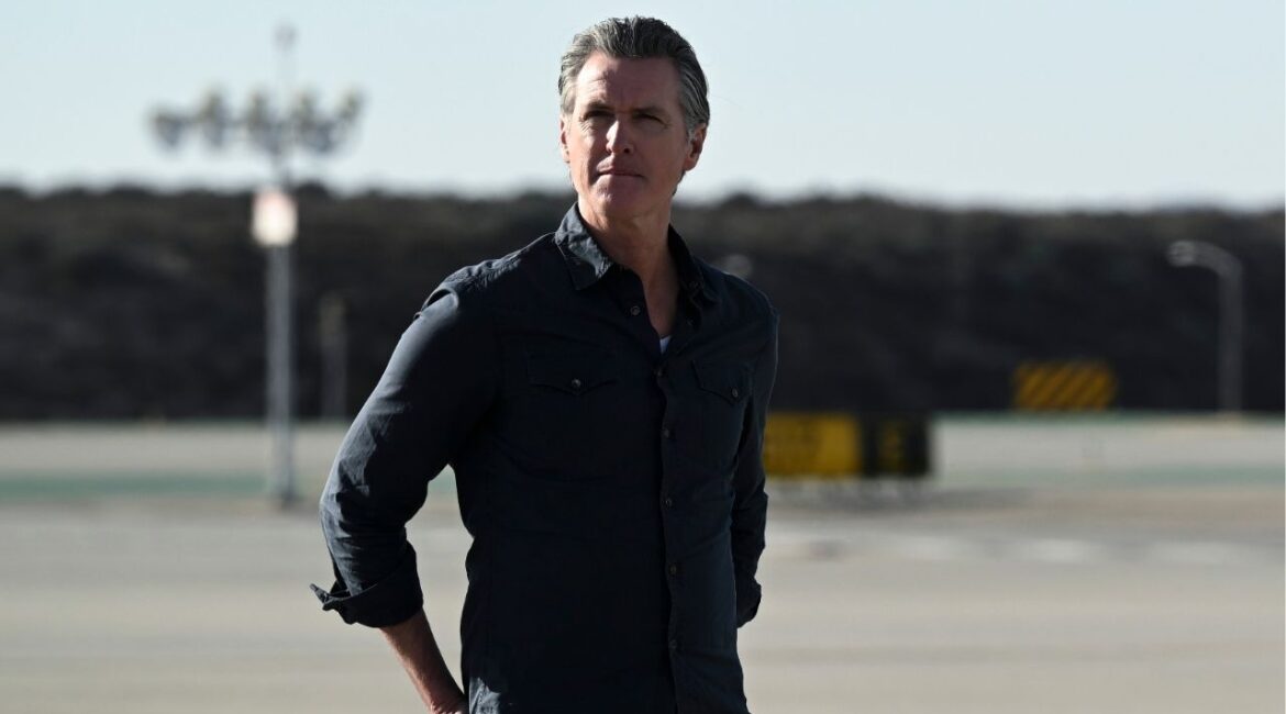 Gov. Gavin Newsom of California waits for President Donald Trump at Los Angeles International Airport in Los Angeles, Jan. 24, 2025. Newsom and the state’s attorney general plan to sue President Trump on Wednesday to try to stop his flurry of tariffs, accusing the president of taking unlawful action to escalate a global trade war that has caused “immediate and irreparable harm” to the state’s economy. (Kenny Holston/The New York Times)