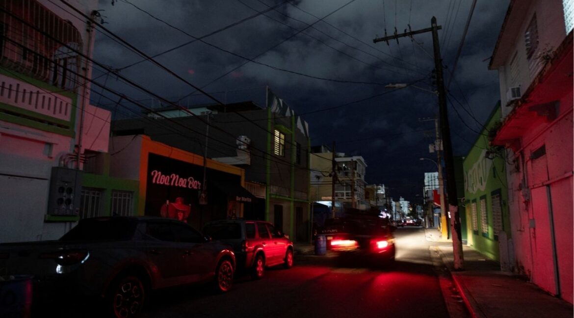 A car drives through a dark street in San Juan, Puerto Rico December 31, 2024. (REUTERS File)
