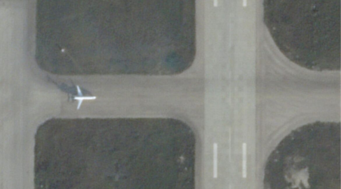 A satellite image, according to Reuters analysis, shows the C5-SKY jet taxiing to the runway before its flight out of Syria, at Hmeimim air base, Syria December 8, 2024. (2025 Planet Labs PBC/Handout via REUTERS)