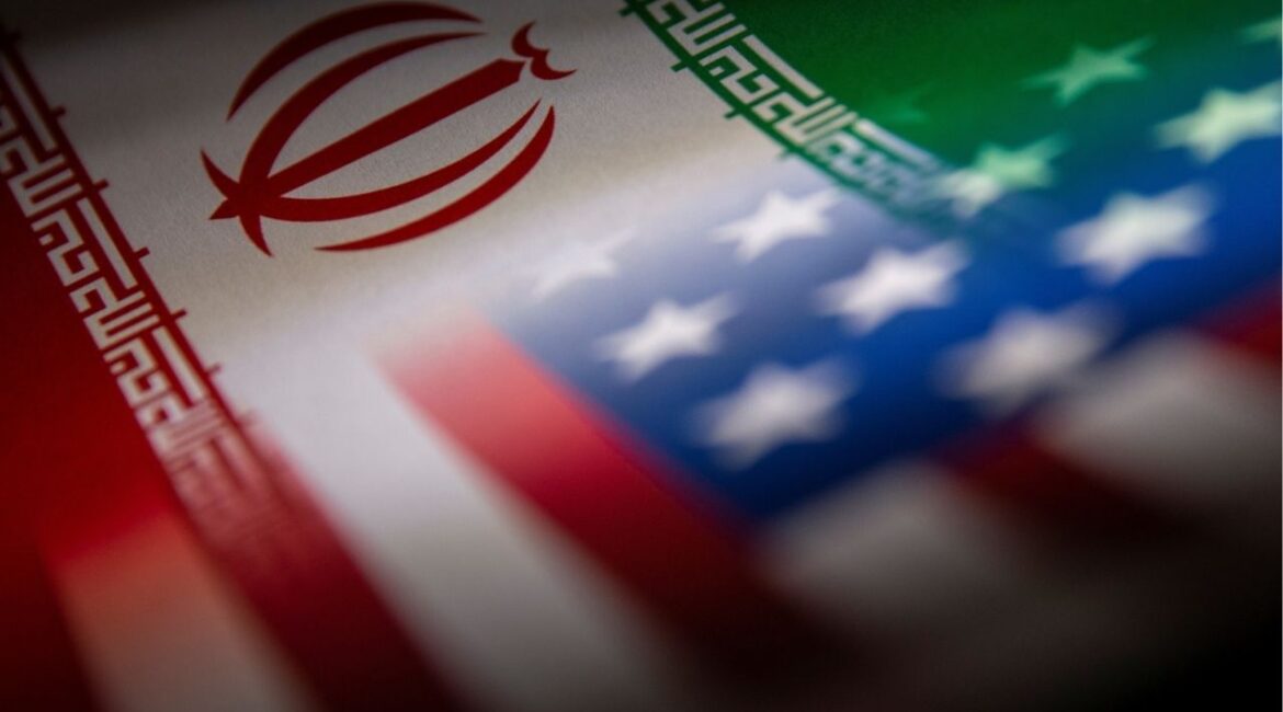 Iran's and U.S.' flags are seen printed on paper in this illustration taken January 27, 2022. (REUTERS File)