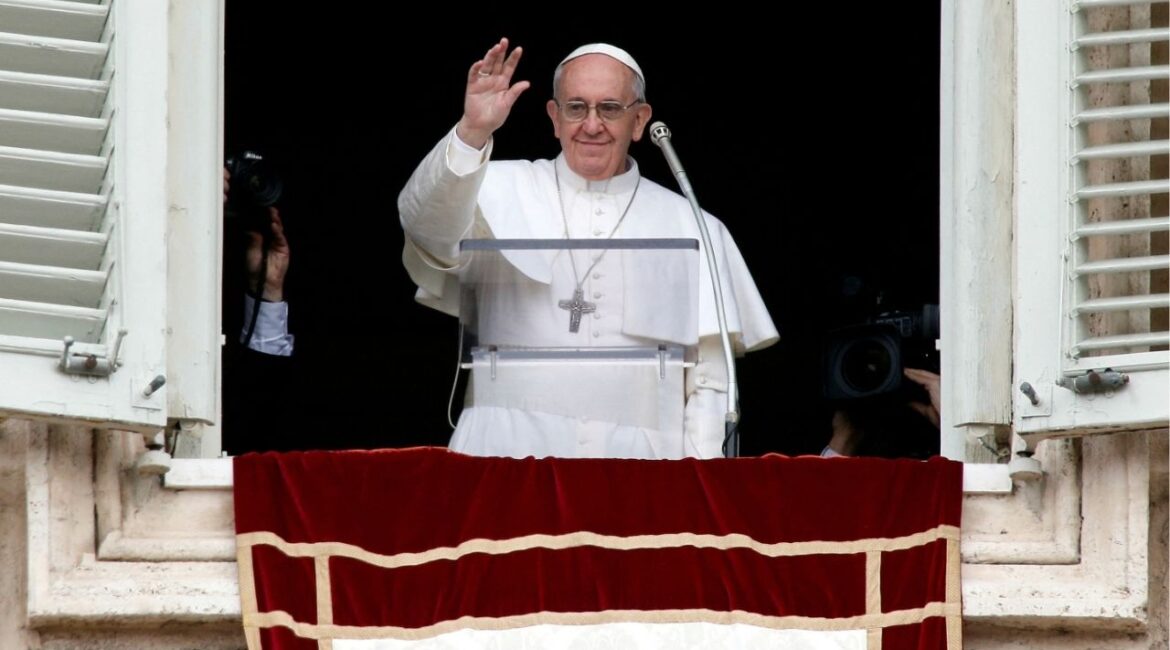 FILE PHOTO: Newly elected Pope Francis appears at the window of his future private apartment to bless the faithful, gathered below in St. Peter's Square, during the Sunday Angelus prayer at the Vatican March 17, 2013. REUTERS/Tony Gentile/File Photo