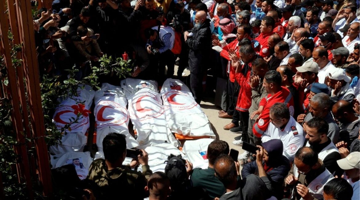 FILE PHOTO: Palestinians mourn medics, who came under Israeli fire while on a rescue mission, after their bodies were recovered, according to the Red Crescent, at Nasser hospital in Khan Younis in the southern Gaza Strip March 31, 2025. (REUTERS/Hatem Khaled/File Photo)