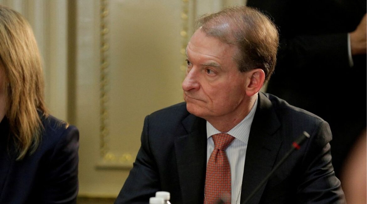 CEO of Patomak Global Partners Paul Atkins takes part in a strategic and policy CEO discussion with U.S. President Donald Trump in the Eisenhower Execution Office Building in Washington, U.S., April 11, 2017. (REUTERS/Joshua Roberts/File Photo)