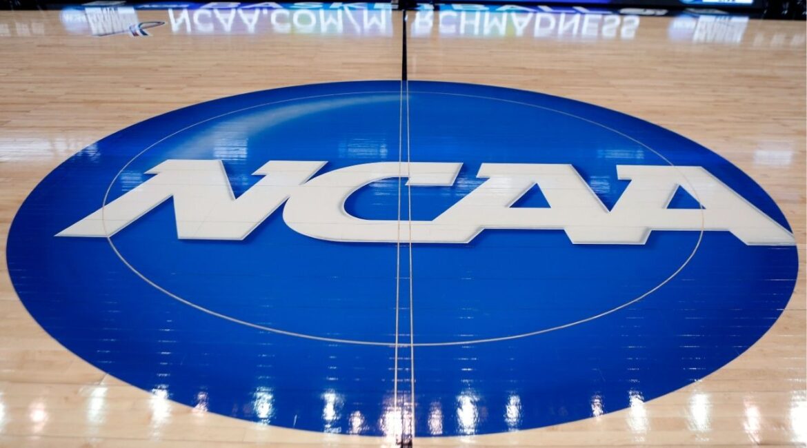 The NCAA logo is displayed at center court at The Consol Energy Center in Pittsburgh, March 18, 2015. (AP File)
