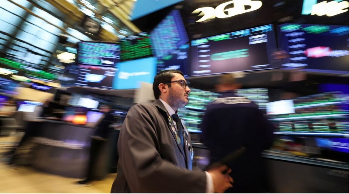 A trader walks, while working on the floor at the New York Stock Exchange (NYSE) in New York City, U.S., April 22, 2025. (REUTERS/Brendan McDermid/File Photo)