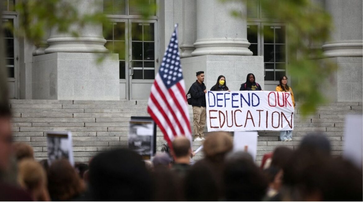 Demonstrators hold a banner during a "Stand Up for Internationals" rally on the campus of Berkeley University in Berkeley, California, U.S., April 17, 2025. (REUTERS/Carlos Barria/File Photo)
