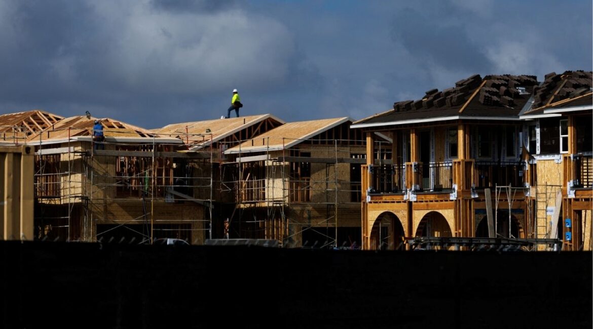 A construction worker pauses for a rest as he helps build residential homes in Irvine, California, U.S., March 28, 2025. (REUTERS/Mike Blake/File photo)