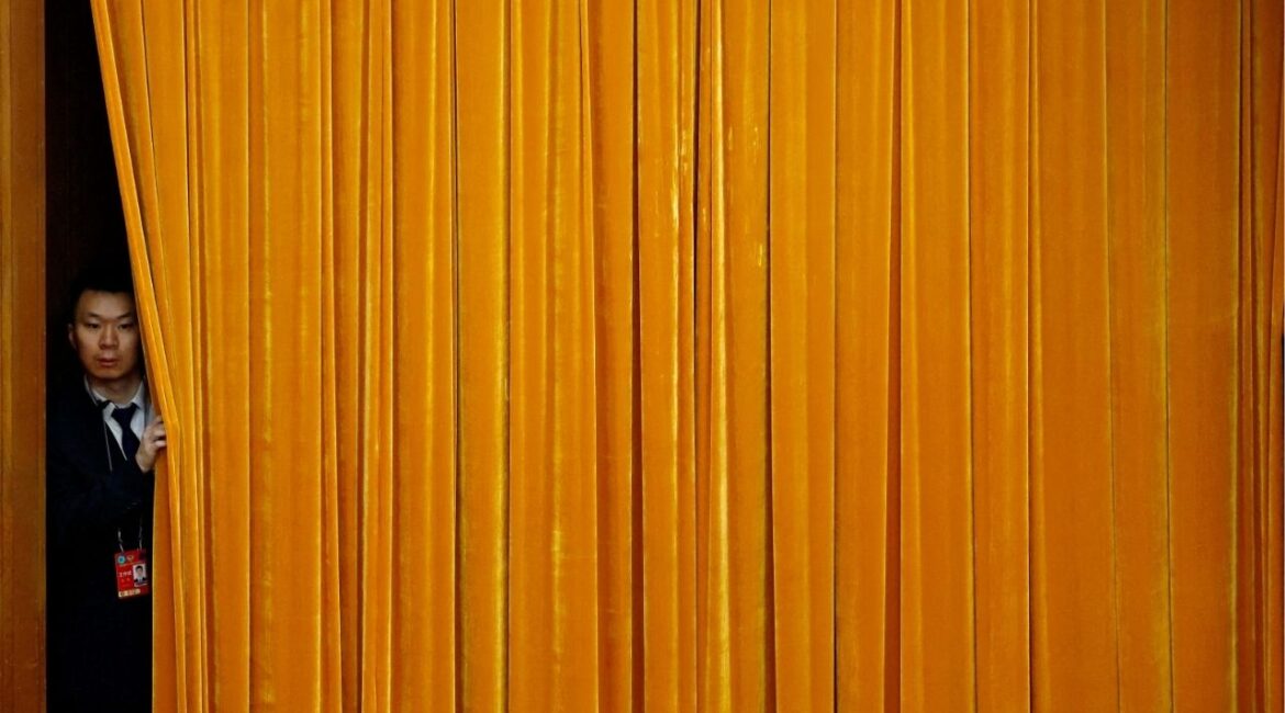 A security officer keeps watch during the second plenary session of the Chinese People's Political Consultative Conference (CPPCC) at the Great Hall of the People in Beijing, China March 7, 2025. (REUTERS/Tingshu Wang/File Photo)