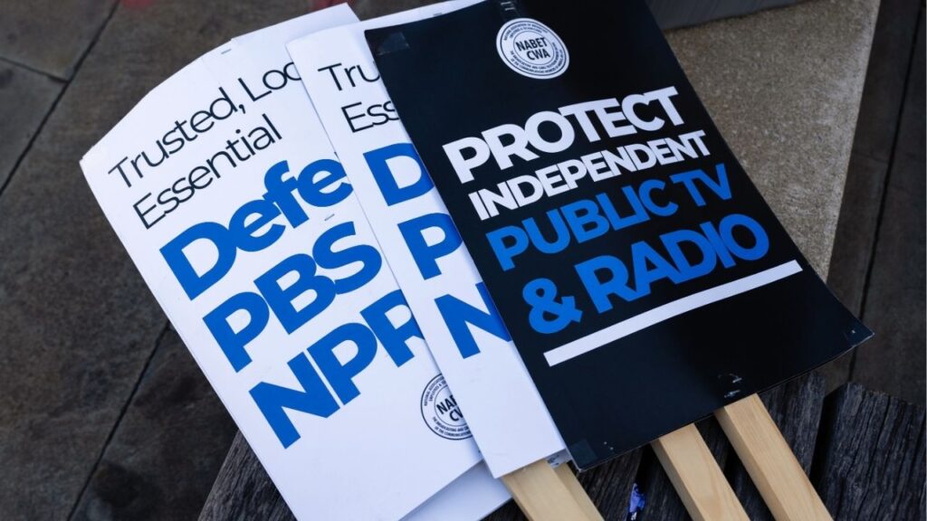 Signs supporting NPR outside its headquarters in Washington on March 26, 2025. The Trump administration has accused NPR and PBS of using public funds to produce biased coverage and “left-wing propaganda.” (Eric Lee/The New York Times)