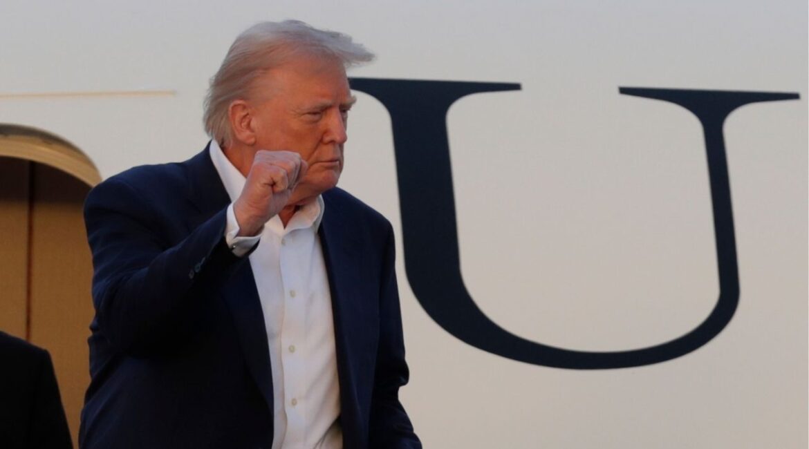 President Donald Trump gestures from the stairs of Air Force One upon his arrival at Joint Base Andrews, Md., Sunday, May 4, 2025. (AP/Luis M. Alvarez)