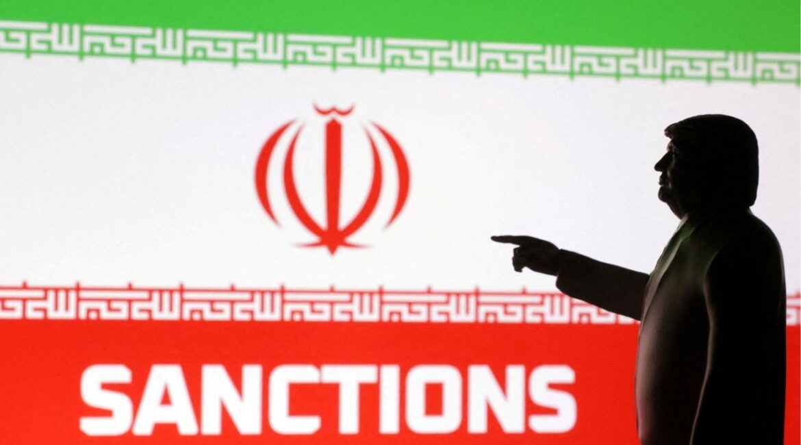 A 3D-printed miniature model depicting U.S. President Donald Trump, Iran flag and word "Sanctions" in this illustration created April 17, 2025. REUTERS/Dado Ruvic/Illustration/File Photo