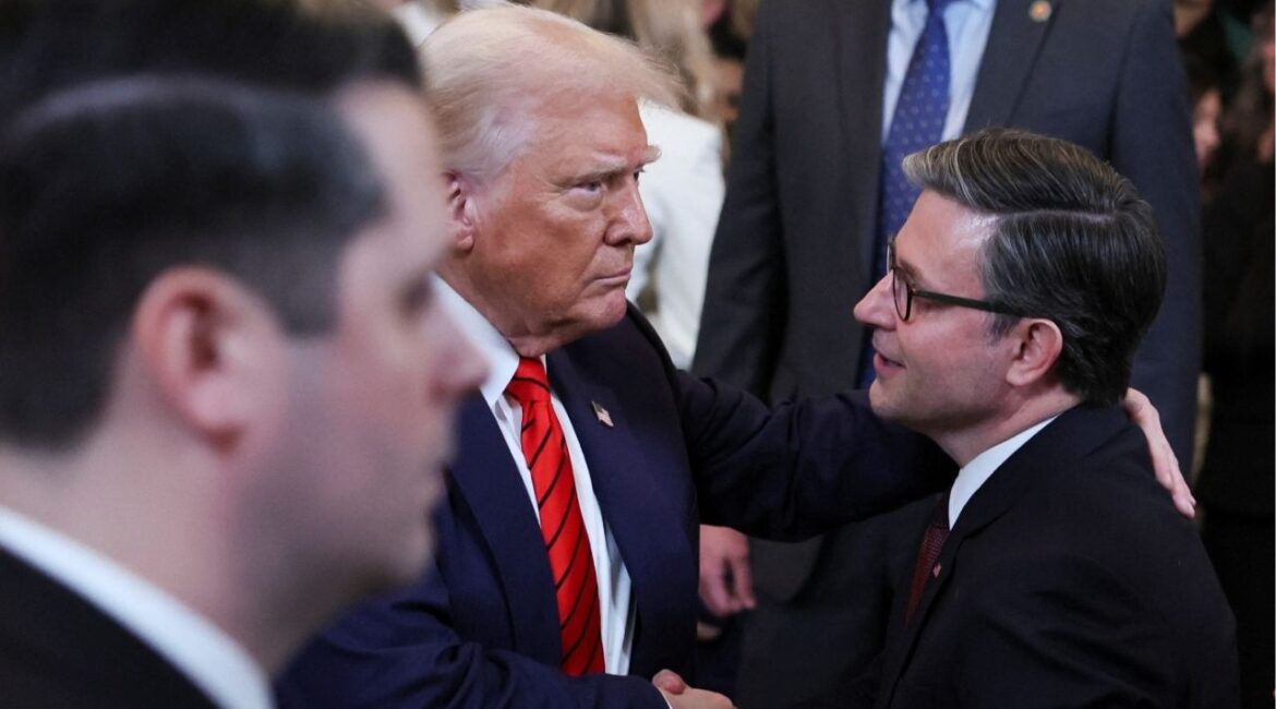 President Donald Trump shakes hands with Speaker of the House Mike Johnson in the East Room at the White House in Washington, U.S., February 5, 2025. (REUTERS/Leah Millis/File Photo)