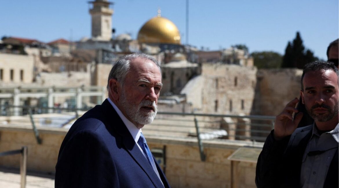 U.S. Ambassador to Israel Mike Huckabee looks on during the day he visits the Western Wall, Judaism's holiest prayer site, in Jerusalem's Old City, April 18, 2025. REUTERS/Ronen Zvulun/File Photo