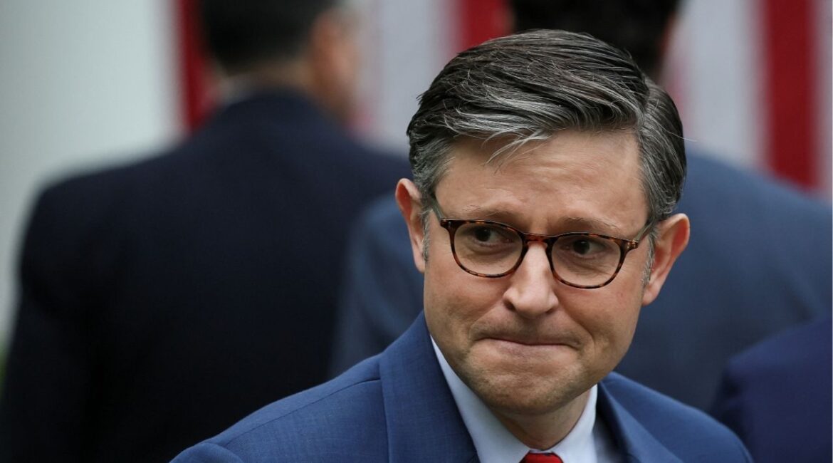 U.S. House of Representatives Speaker Mike Johnson (R-LA) looks on, after President Donald Trump delivered remarks on tariffs, in the Rose Garden at the White House in Washington, D.C., U.S., April 2, 2025. REUTERS/Leah Millis/File Photo
