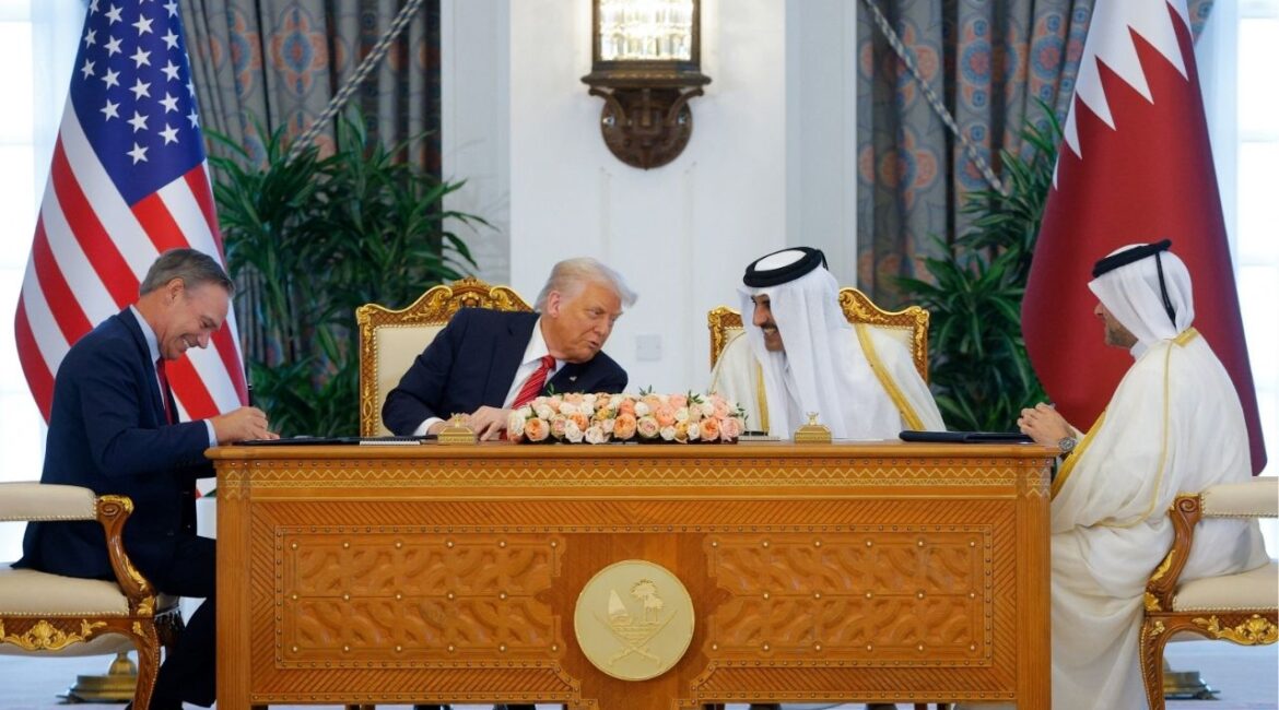 U.S. President Donald Trump, Qatar's Emir Tamim bin Hamad Al Thani and Boeing CEO Kelly Ortberg attend a signing ceremony in Doha, Qatar, May 14, 2025. REUTERS/Brian Snyder