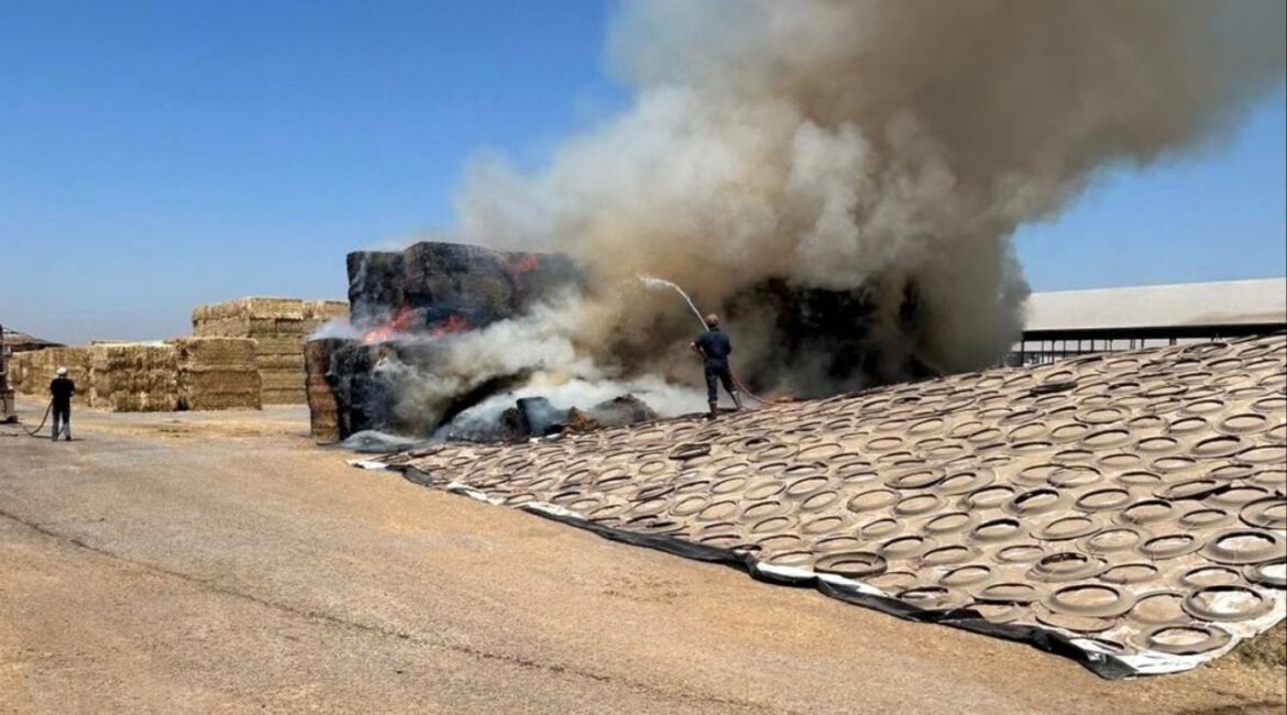 Tulare County firefighters, along with crews from Lindsay City and Cal Fire TUU, are working to contain a haystack fire near Avenue 240 and Road 188 on Wednesday, May 21, 2025. (Tulare County Fire)