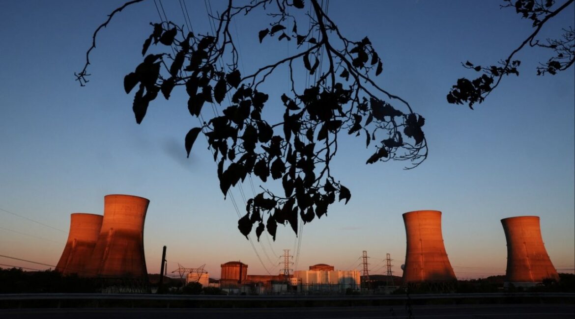 The Three Mile Island Nuclear power plant is seen at sunrise in Middletown, Pennsylvania, U.S., October 16, 2024. REUTERS/Shannon Stapleton/File Photo