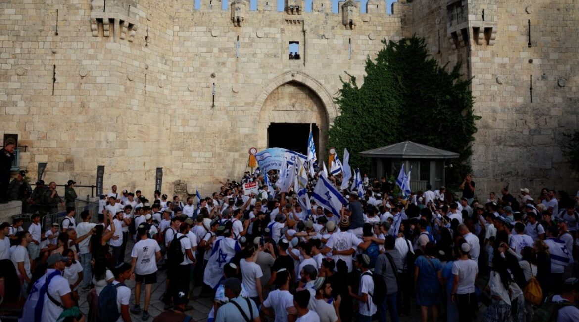 Israelis gather with flags by Damascus Gate to Jerusalem's Old City, as they mark Jerusalem Day, in Jerusalem May 26, 2025. REUTERS/Ammar Awad