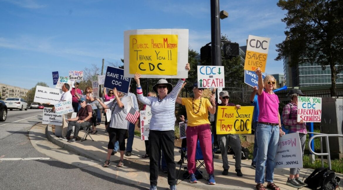 Demonstrators protest outside the Center for Disease Control, in Atlanta, after the Trump administration began mass layoffs of 10,000 staffers at U.S. health agencies under the Department of Health and Human Services, including the FDA, CDC and the National Institutes of Health, in Atlanta, Georgia, U.S. April 1, 2025. REUTERS/Megan Varner/File Photo