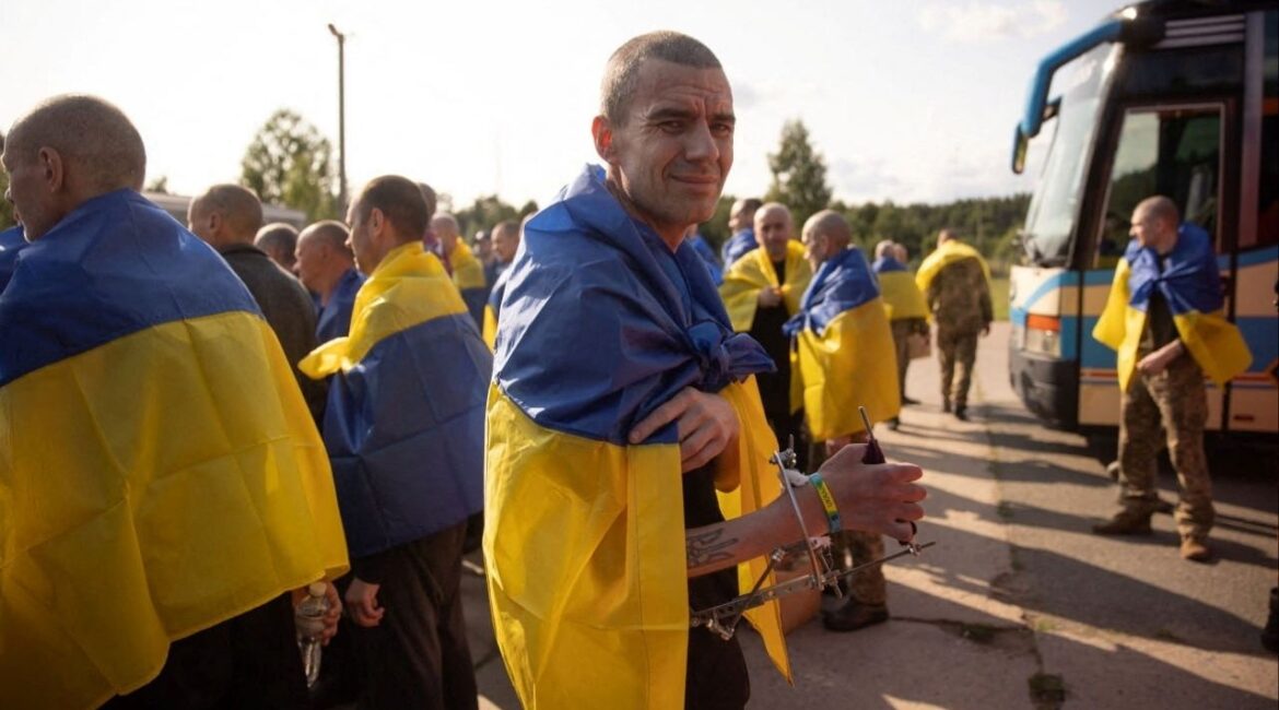 A Ukrainian prisoner of war (POWs) looks on as he stands witgh others after a swap, amid Russia's attack on Ukraine, at an unknown location in Ukraine, in this handout picture released June 10, 2025. Ukrainian Presidential Press Service/Handout via REUTERS