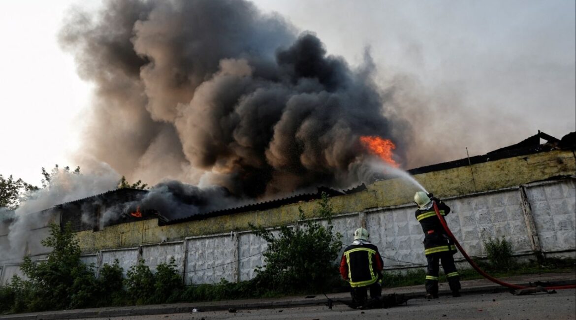 Firefighters work at the site of a Russian drone strike, amid Russia's attack on Ukraine, in Kyiv, Ukraine June 10, 2025. REUTERS/Thomas Peter