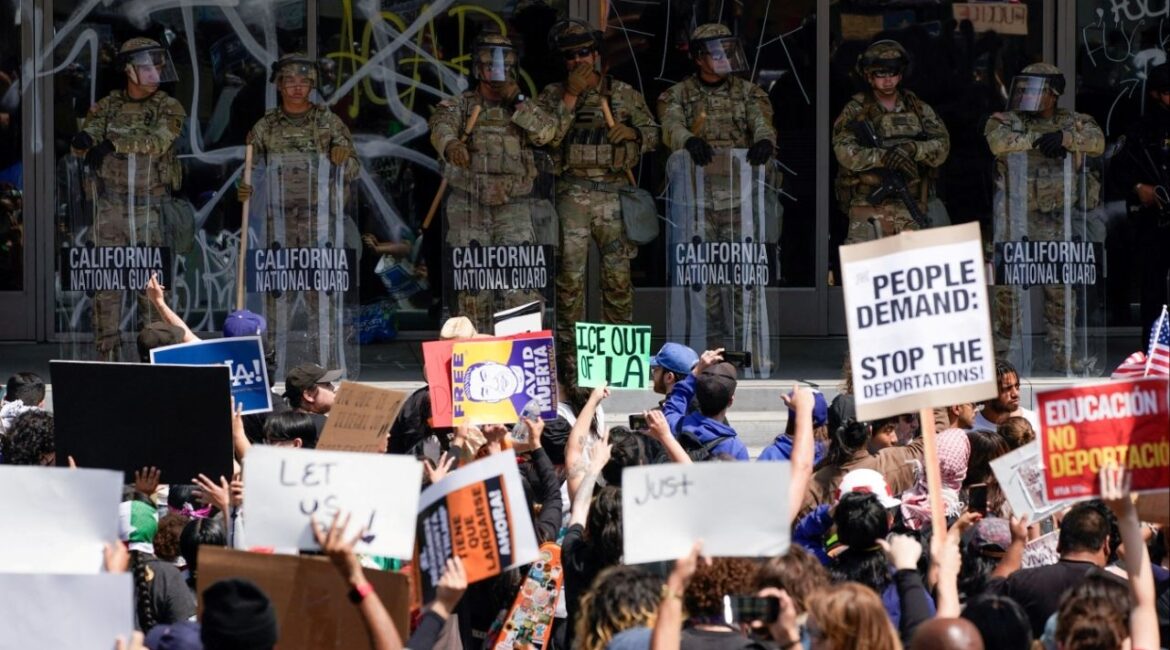 People attend a rally against federal immigration sweeps, in downtown Los Angeles, California, U.S. June 9, 2025. REUTERS/David Ryder