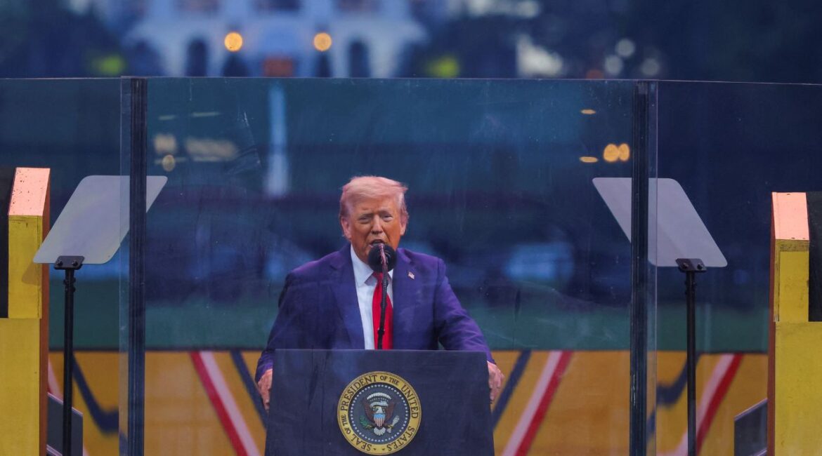 President Donald Trump speaks as he attends a military parade to commemorate the U.S. Army's 250th Birthday, on the day of his 79th birthday, in Washington, D.C., U.S., June 14, 2025. REUTERS/Carlos Barria/File Photo