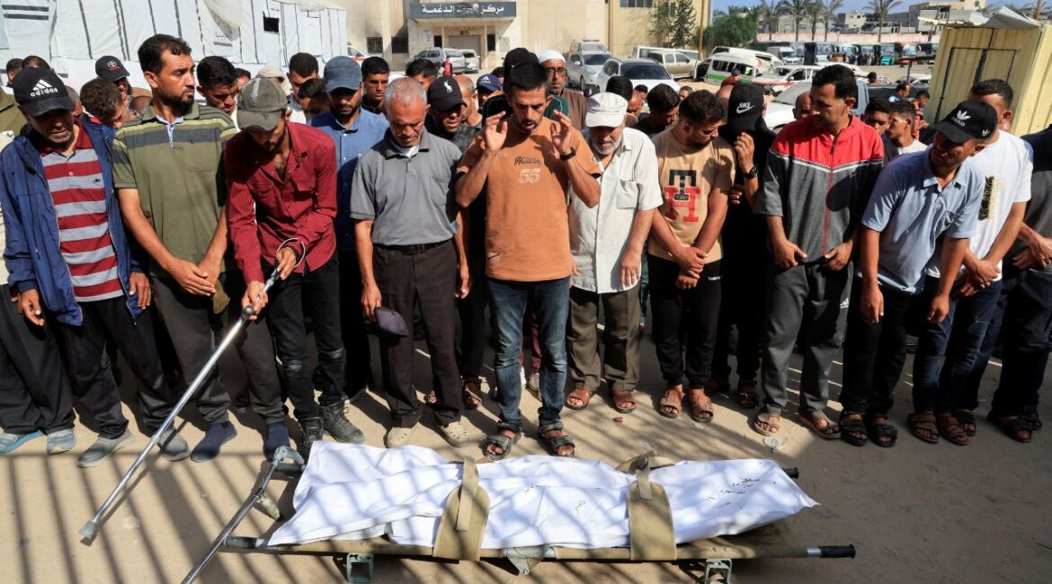 Mourners pray during the funeral of a Palestinian killed in what the Gaza health ministry says was Israeli fire near a distribution center in Rafah, at Nasser hospital in Khan Younis, in the southern Gaza Strip, June 15, 2025. REUTERS/Hatem Khaled