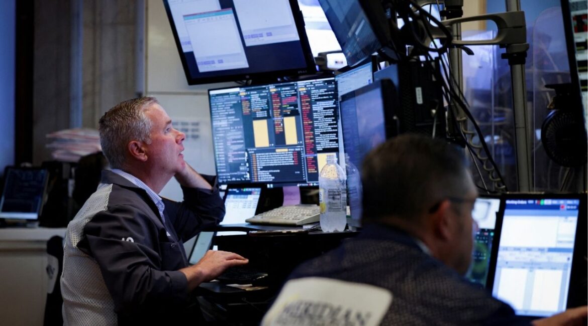 A trader works on the floor at the New York Stock Exchange (NYSE) in New York City, U.S., July 7, 2025. (Reuters/Jeenah Moon)
