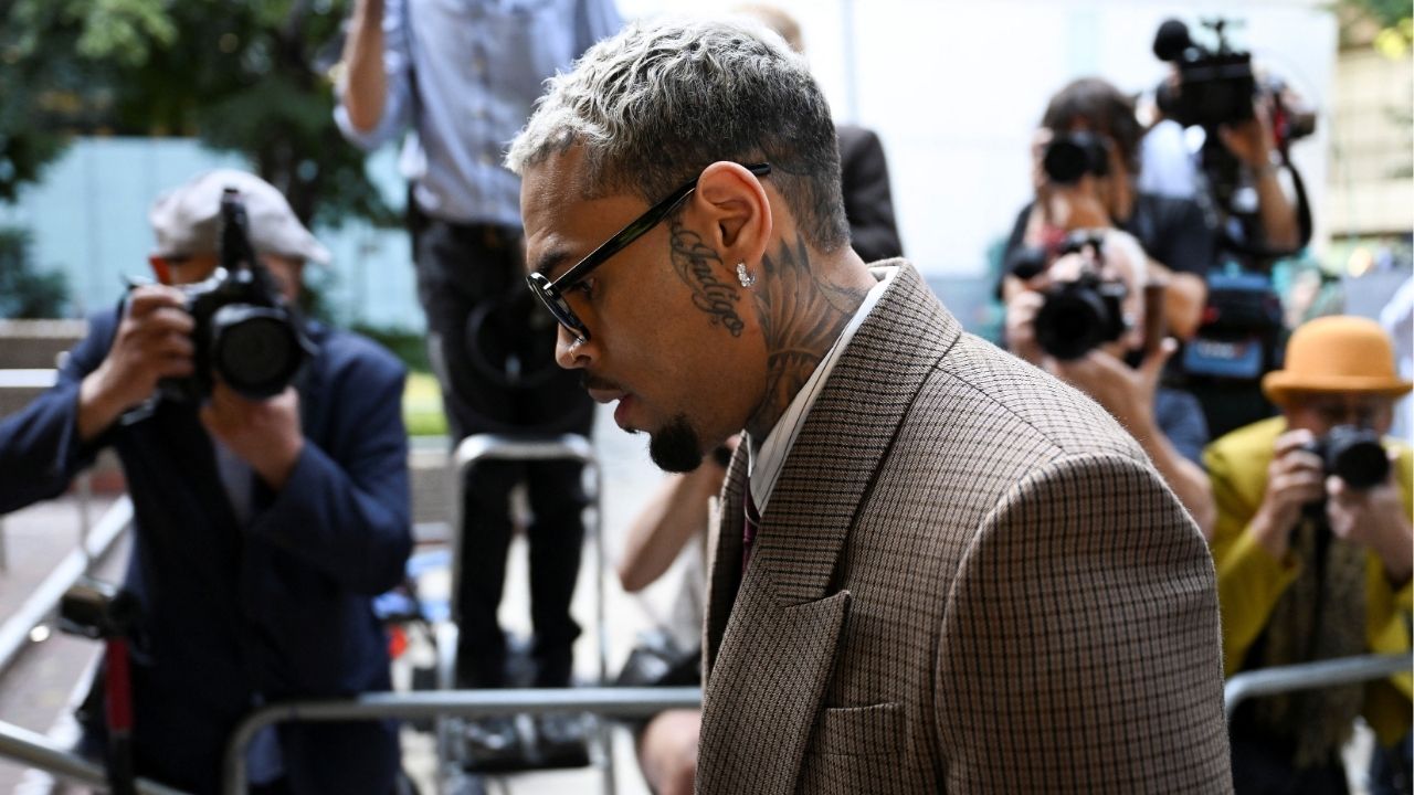 U.S. singer Chris Brown, who has been charged with inflicting grievous bodily harm in what prosecutors said was an "unprovoked attack" on a music producer at the Tape nightclub in central London in 2023, walks outside the Southwark Crown Court in London, Britain, July 11, 2025. (Reuters/Chris J. Ratcliffe)