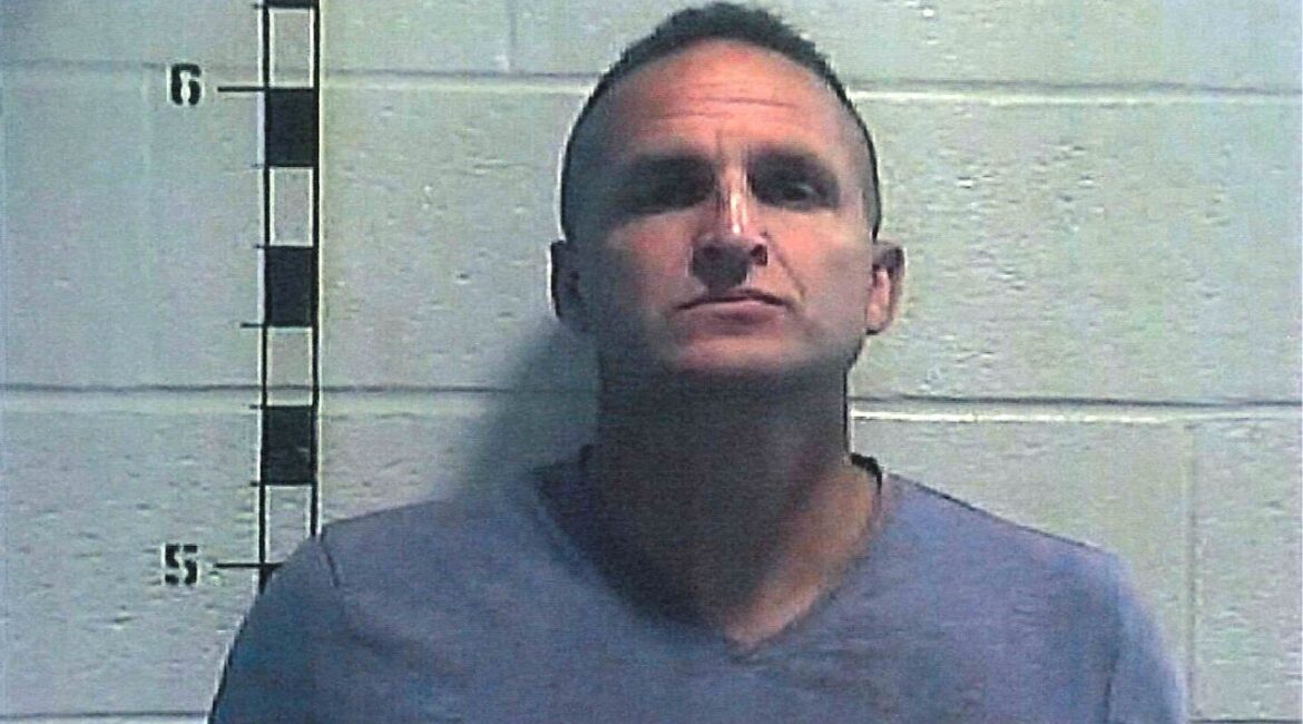 Former Louisville police detective Brett Hankison poses for a booking photograph at Shelby County Detention Center in Shelbyville, Kentucky, U.S. September 23, 2020. Picture taken September 23, 2020. Shelby County Detention Center/Handout via REUTERS.