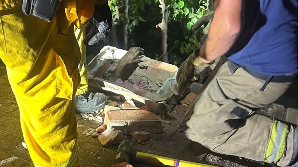 A juvenile girl was rescued early Thursday, July 17, 2025, after becoming trapped inside a chimney at a Fresno home and was hospitalized with minor injuries. (Fresno FD)