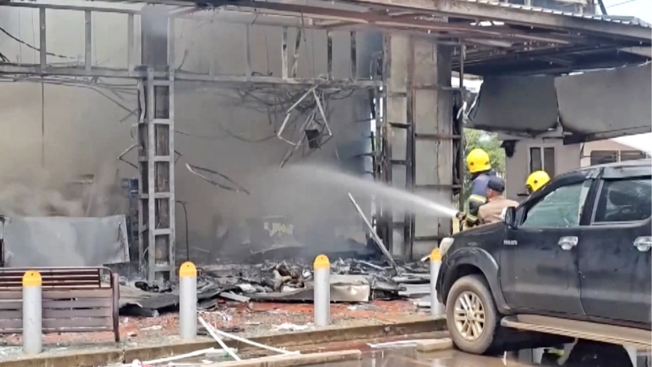 Firefighters work to extinguish fire at a convenience store at a gas station, amid the clashes between Thailand and Cambodia, in Kantharalak district, Sisaket province, Thailand, July 24, 2025, in this screengrab obtained from a handout video. TPBS/Handout via REUTERS