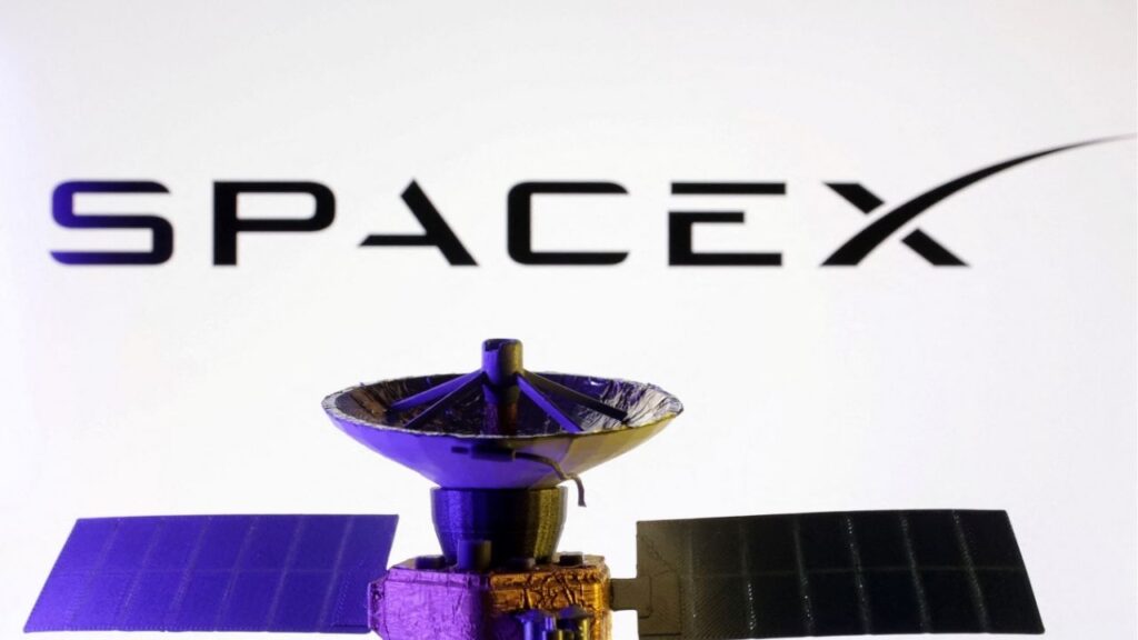 SpaceX logo and miniature satellite model are seen in this illustration taken, March 10, 2025. (Reuters File)