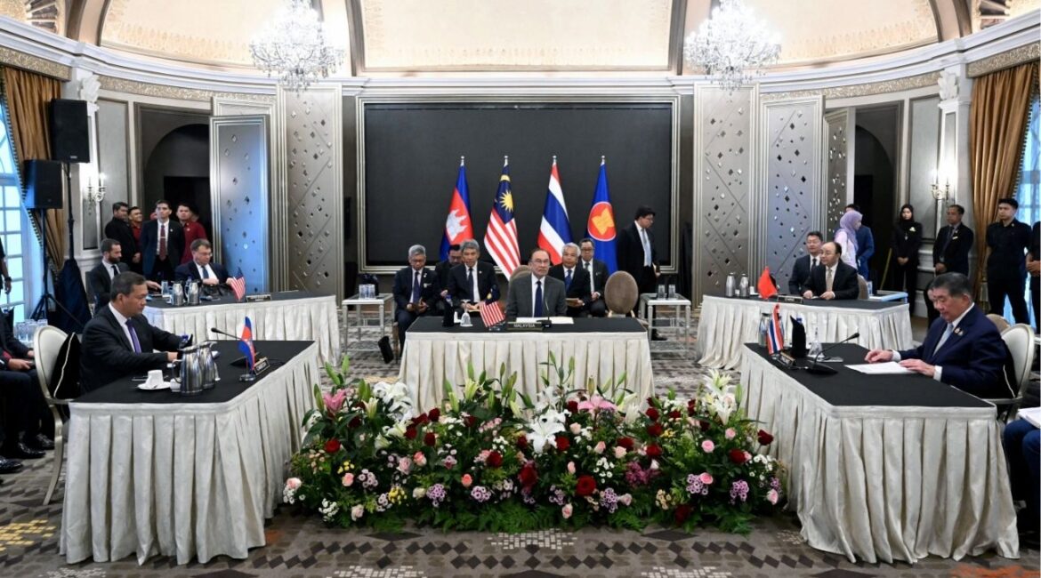 Malaysia's Prime Minister Anwar Ibrahim looks on as Cambodia's Prime Minister Hun Manet and Thailand's acting Prime Minister Phumtham Wechayachai take part in mediation talks on the Thailand–Cambodia border conflict, in Putrajaya, Malaysia July 28, 2025.