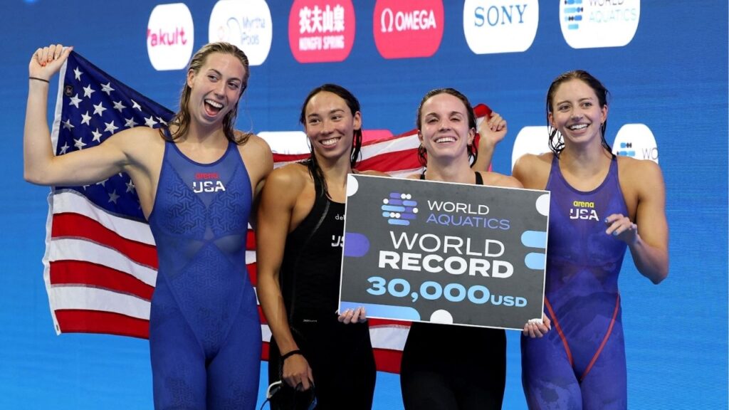 World Aquatics Championships - Women 4x100m Medley Relay Final - World Aquatics Championships Arena, Singapore - August 3, 2025 Regan Smith, Kate Douglass, Gretchen Walsh and Torri Huske of the U.S. celebrate after winning the final and making a new world record REUTERS/Edgar Su