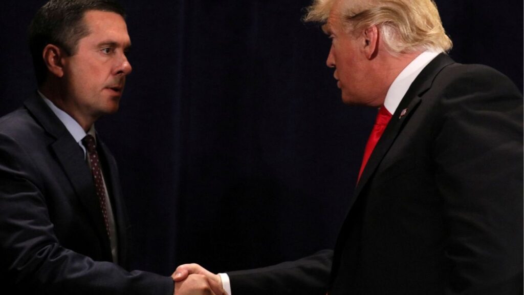 President Donald Trump shakes hands with Representative Devin Nunes (R-CA) after signing a presidential memorandum focused on water policy in California's Central Valley, at a conference center in Scottsdale, Arizona, U.S., October 19, 2018. (Reuters File)