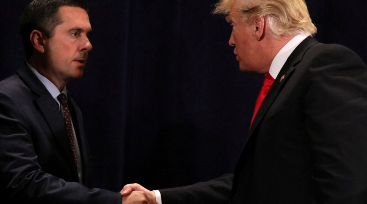 President Donald Trump shakes hands with Representative Devin Nunes (R-CA) after signing a presidential memorandum focused on water policy in California's Central Valley, at a conference center in Scottsdale, Arizona, U.S., October 19, 2018. (Reuters File)