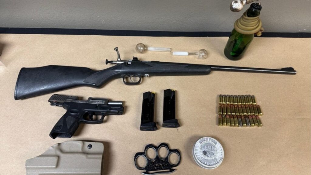 A convicted felon was arrested in Fresno after police found him in a stolen truck with drugs, brass knuckles, and loaded guns. (Fresno PD)