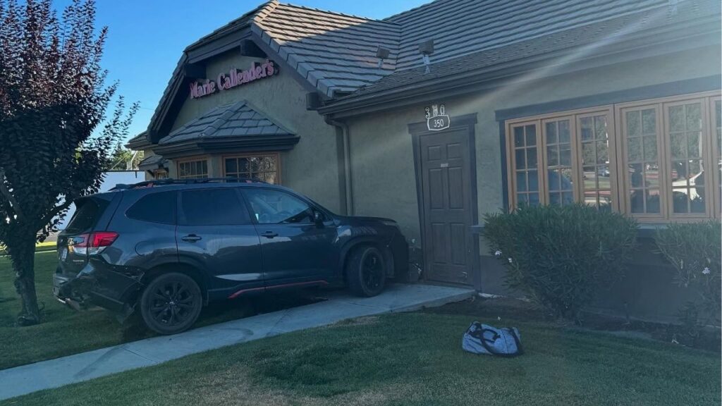 A driver ran a red light in Visalia on Wednesday, August 6, 2025, morning, causing a crash that sent another vehicle into a Marie Callender’s restaurant, police said. (Visalia PD)