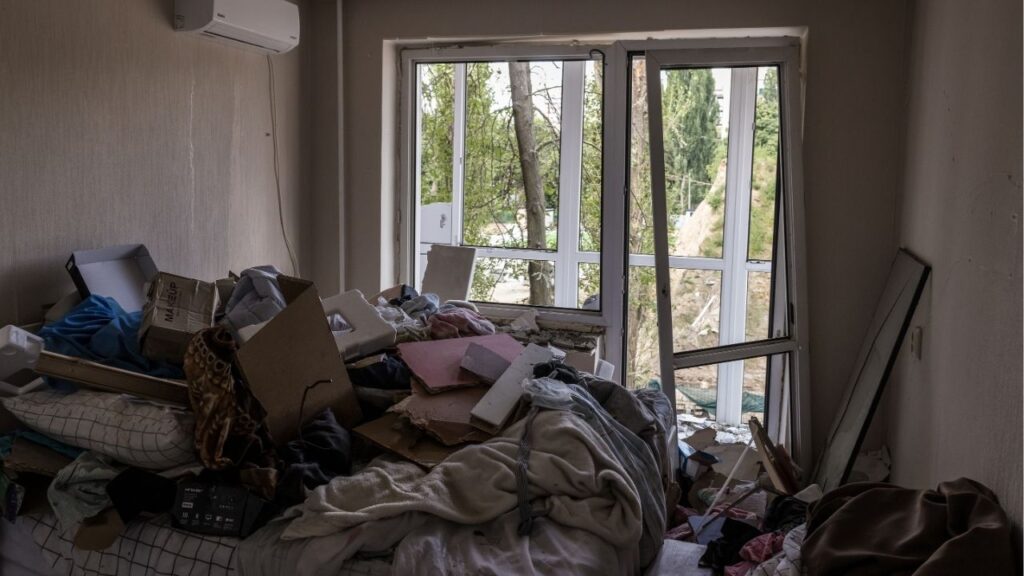 A view inside one of the apartments in the residential building that was partly destroyed by a Russian missile the night of July 31 in Kyiv, Ukraine, Aug. 4, 2025. Veronika Osintseva went to sleep in her bed on the ninth floor of an apartment building in Kyiv and woke up on a pile of rubble outside. She saw her leg covered in blood and cried out for help, thinking only of the pain, she would later say, and not how she had survived. (Oksana Parafeniuk/The New York Times)