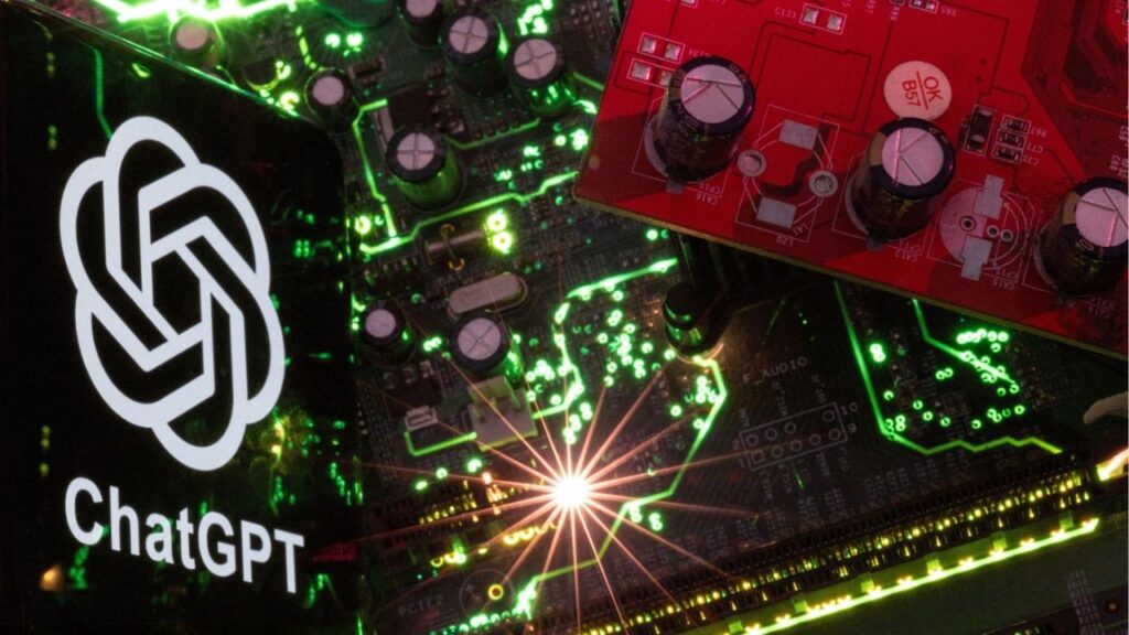 A smartphone with a displayed ChatGPT logo is placed on a computer motherboard in this illustration taken February 23, 2023. (Reuters File)