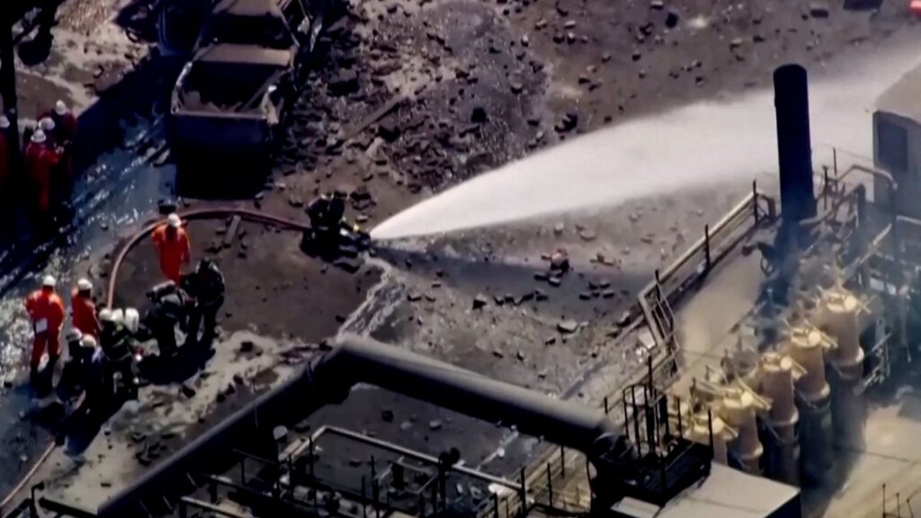 Firefighters Spray Water on Site of US Steel Plant Explosion