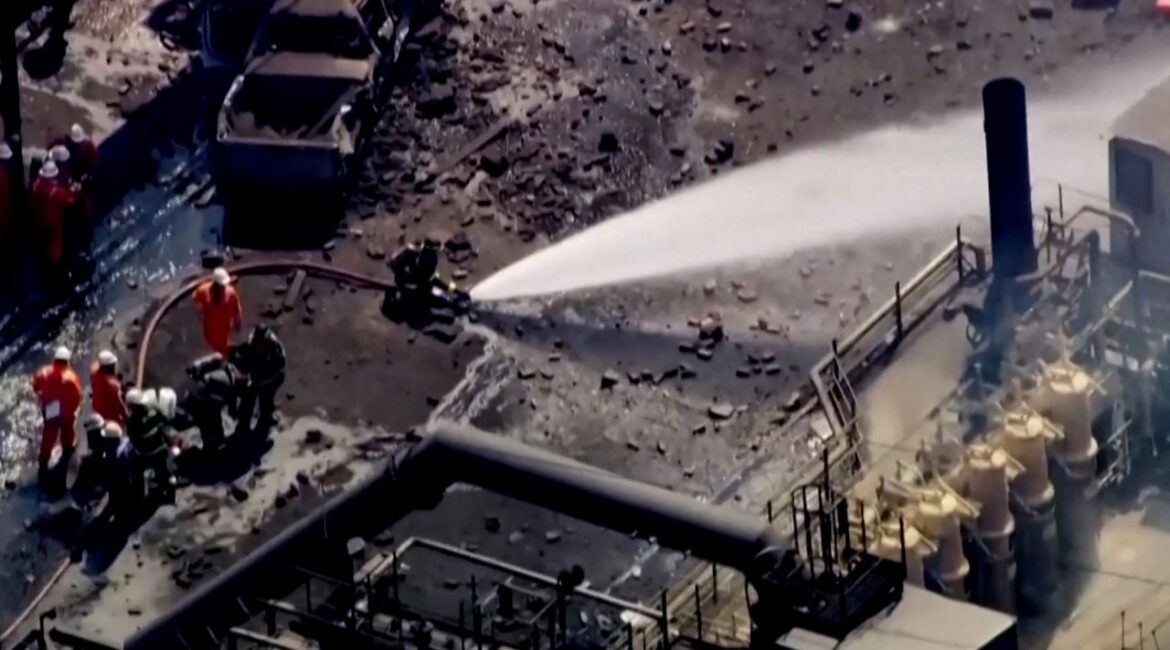 Firefighters Spray Water on Site of US Steel Plant Explosion
