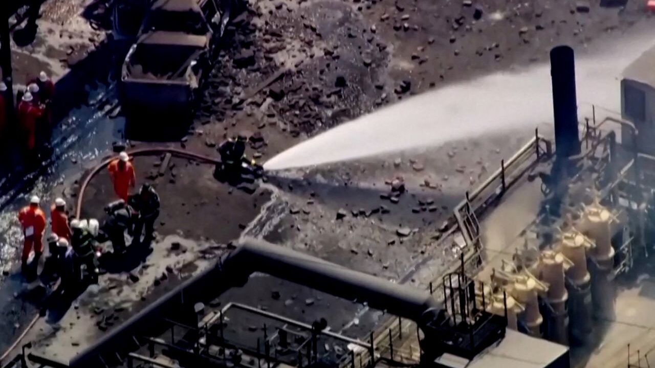 Firefighters Spray Water on Site of US Steel Plant Explosion